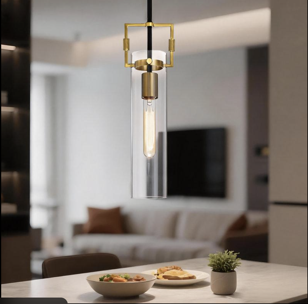 Clear glass pendant suspended over a dining table